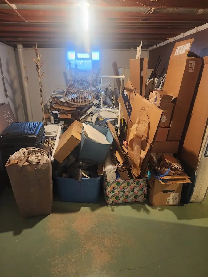 Roll-off dumpster container at job site for 20 Yard Dumpster Rental in Haring